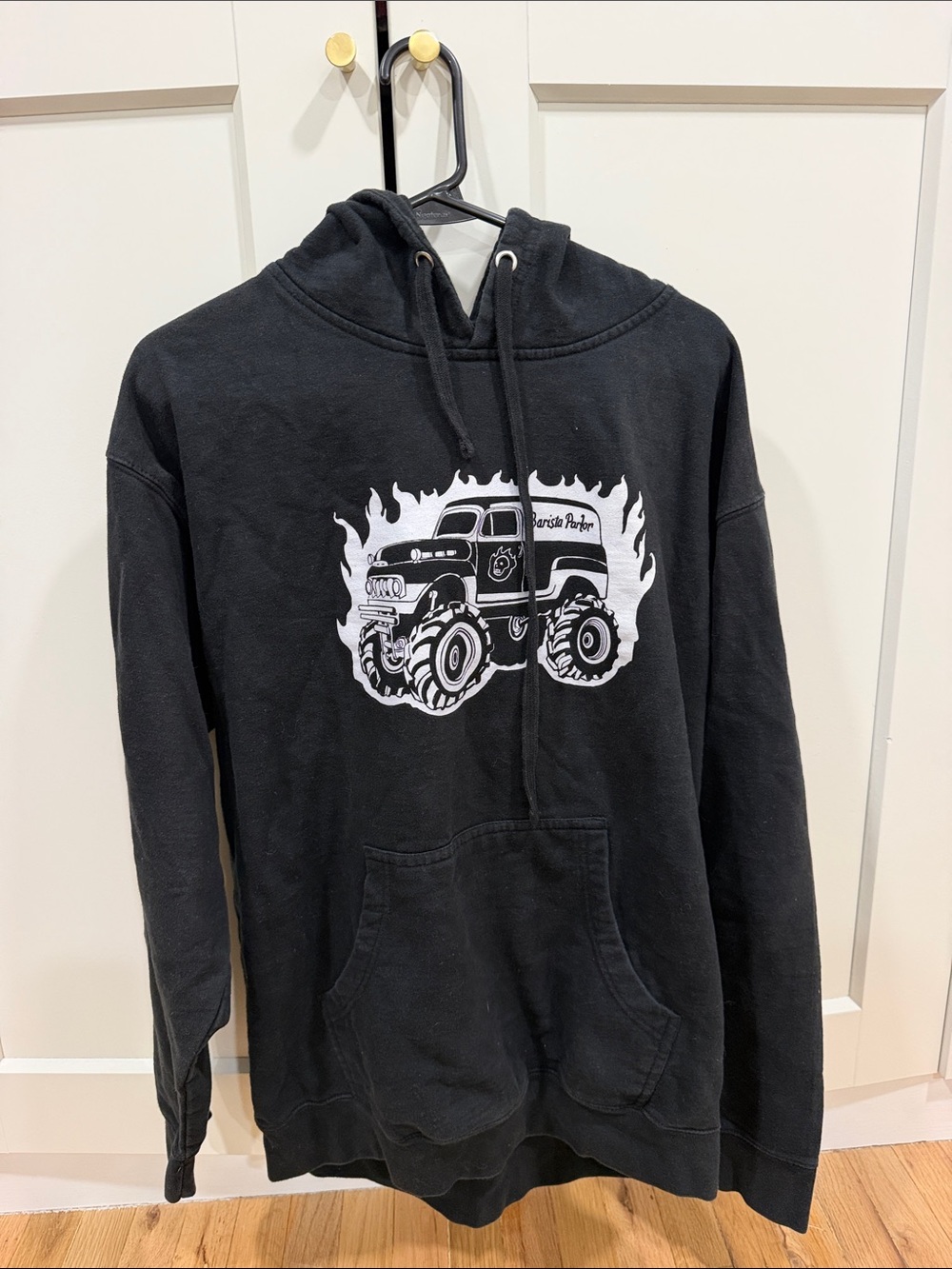 Black Pullover Hoodie with White Monster Truck Graphic